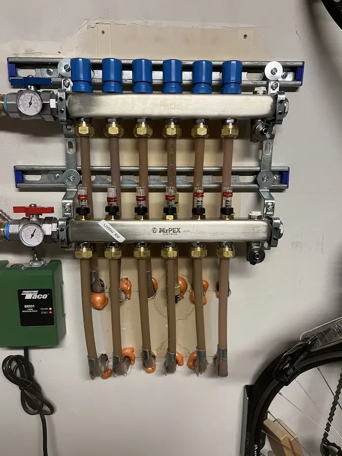 Plumber performing Water Heater Repair at a residential property in Ashby